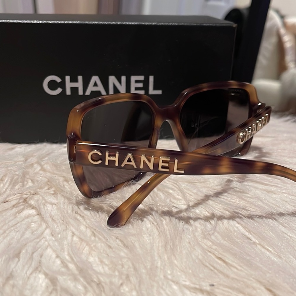 Chanel sun glasses. With case and box.